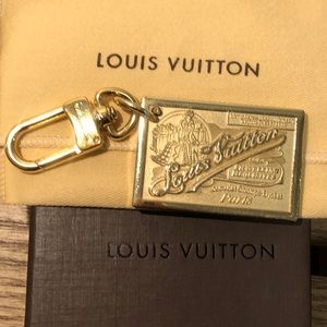 Authentic Louis Vuitton bag charm.